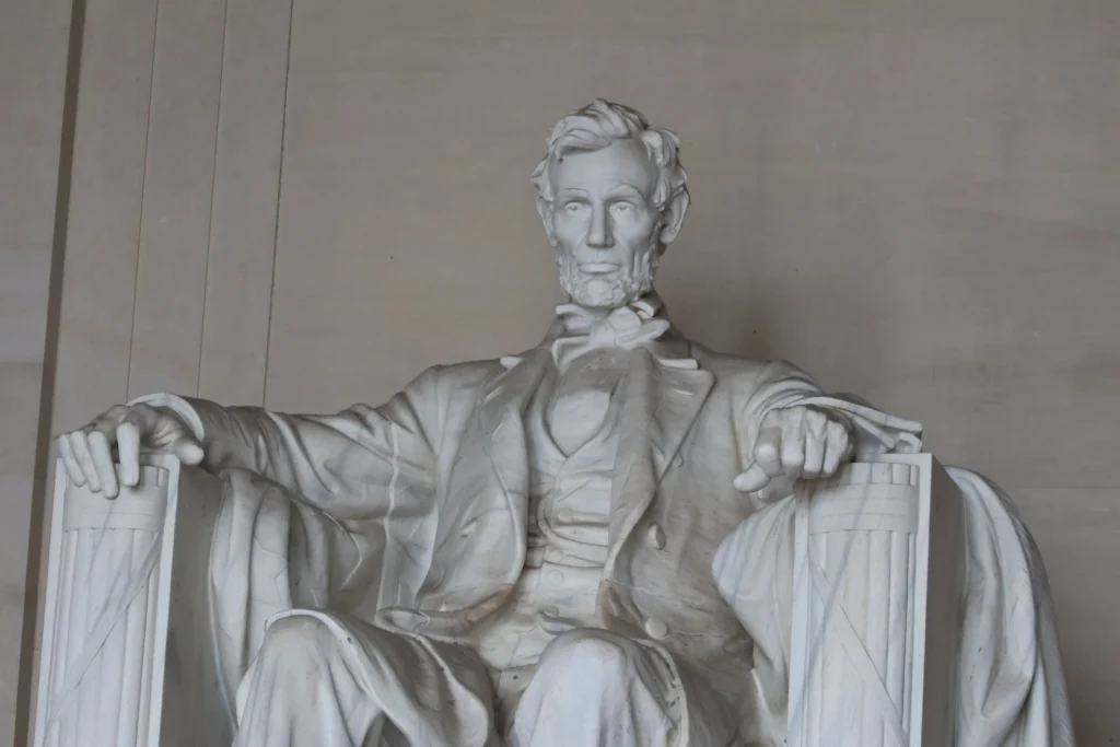 Statue of Abraham Lincoln at the Lincoln Memorial in Washington, DC, symbolizing leadership and justice